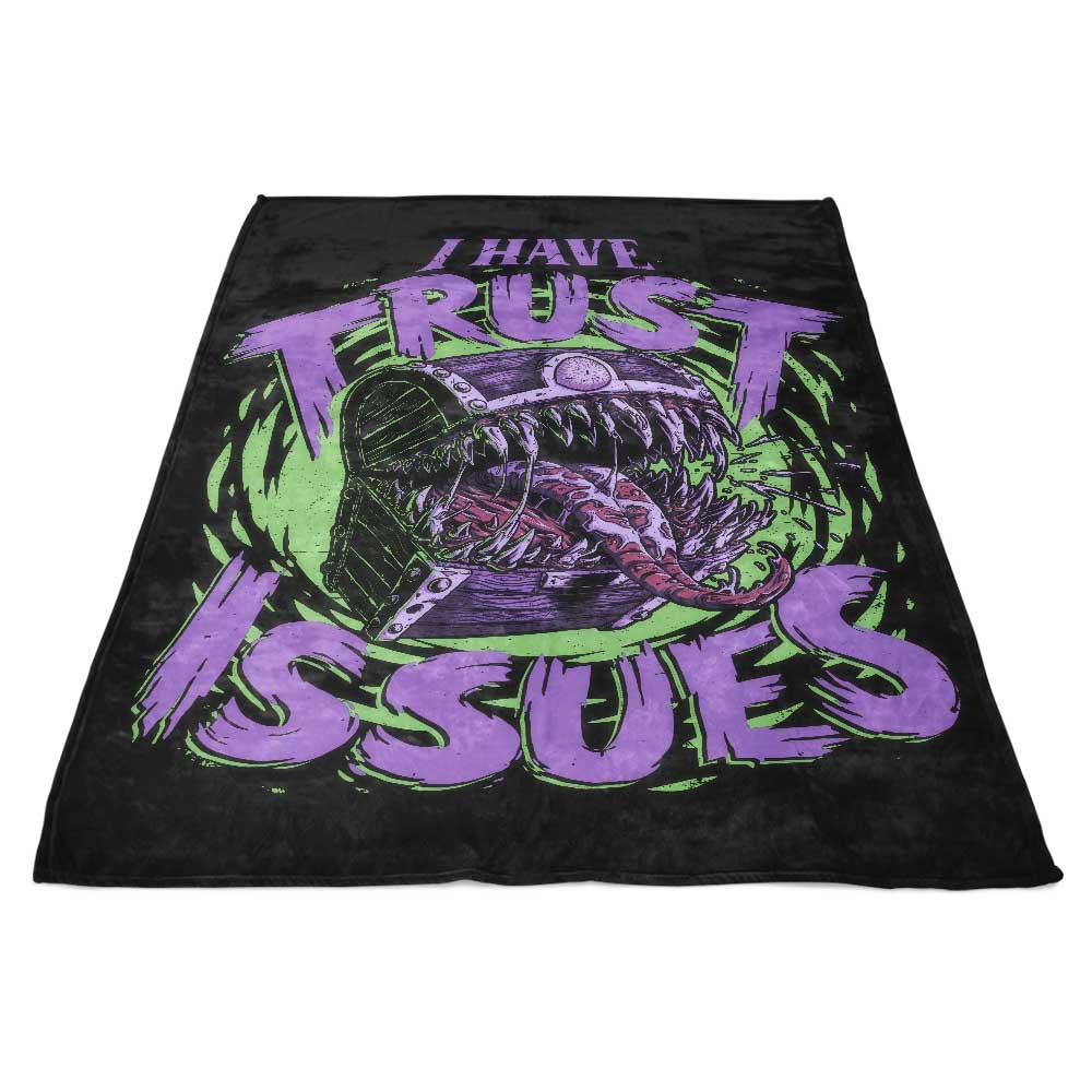 Studio Mootant's Fleece Blanket Featuring the 'I Have Trust Issues' Design
