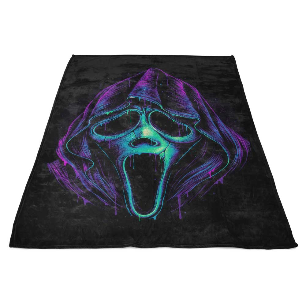 Fleece Blanket with a Mysterious Glowing Ghost Design
